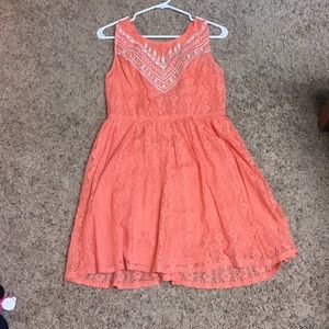 Peach/coral lace dress.